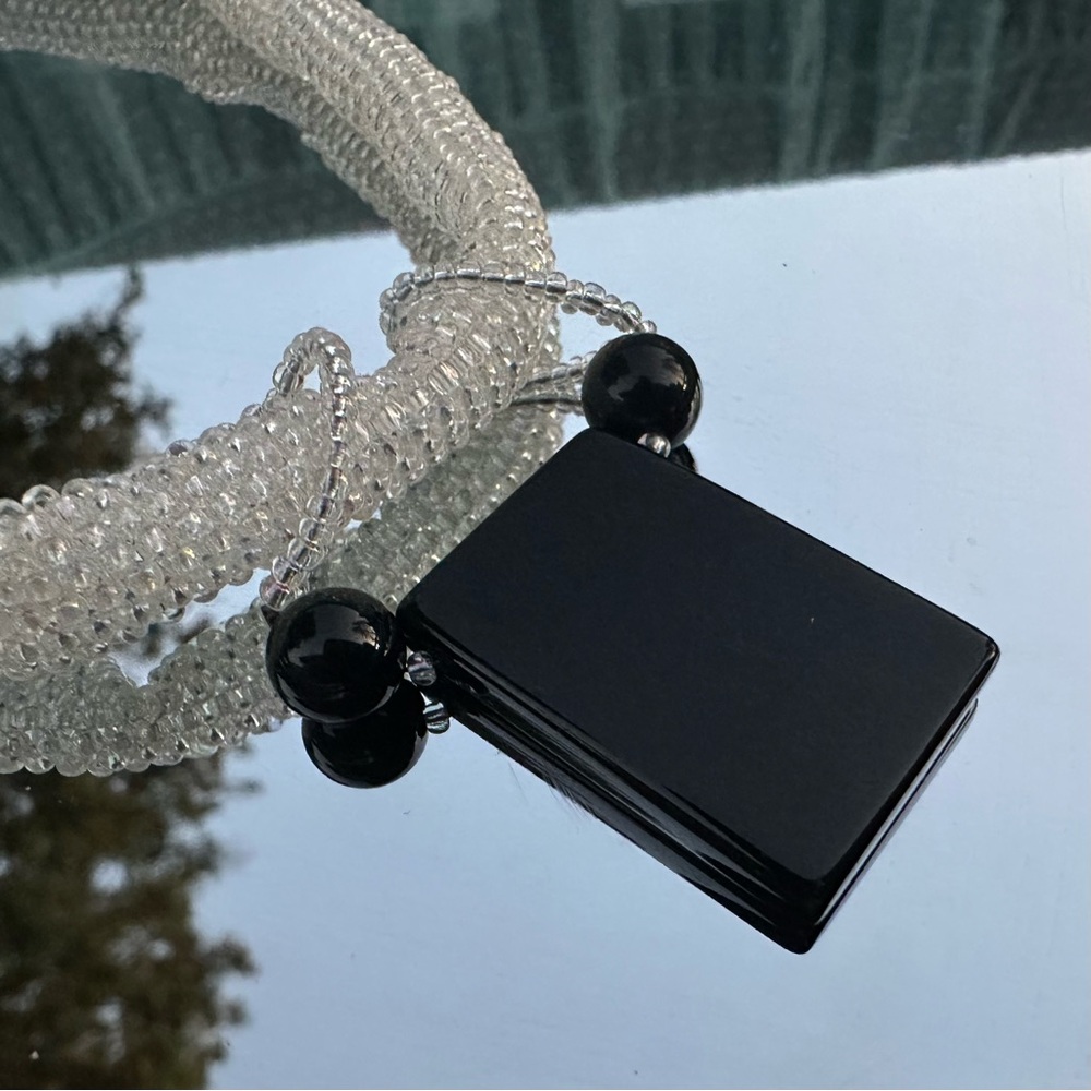 Intricate handmade white-beaded necklace & black pendant tube of beads - Picture 4 of 7